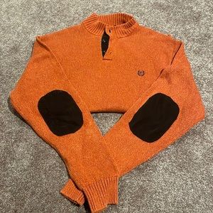 Three button wool sweater.